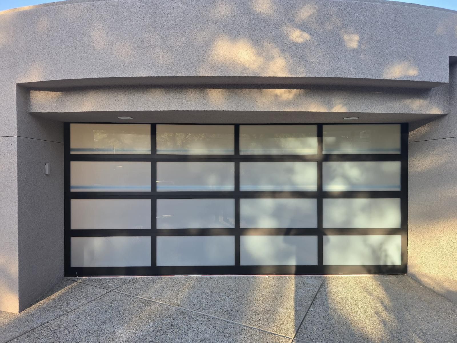 New garage door installation on residential home