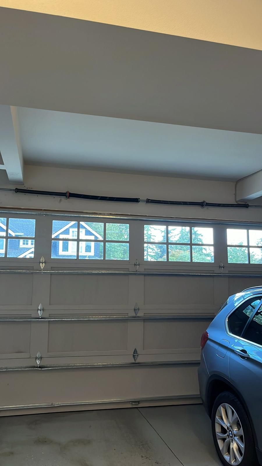 Professional garage door technician at work